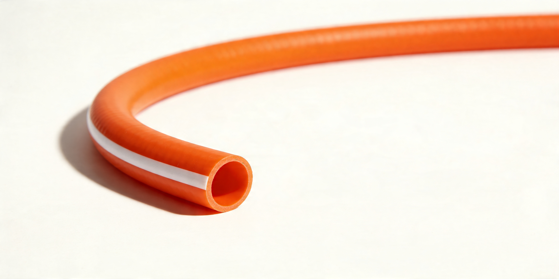 Manguera de Gas doméstico color naranja con franja blanca